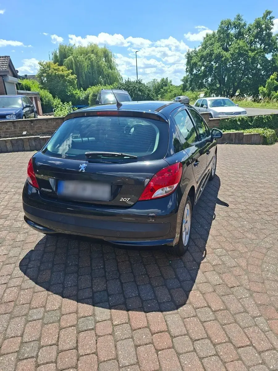 Gebraucht Peugeot 207 95 PS (69 kW) 2010 Schwarz Kleinwagen