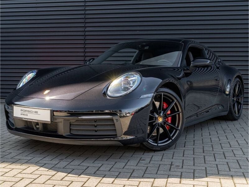 Tiefschwarzmetallic Gebraucht 2021 Porsche 911 Carrera 4S Sport Coupé | 119.890 € (Fairer Preis) - Bild 1/4