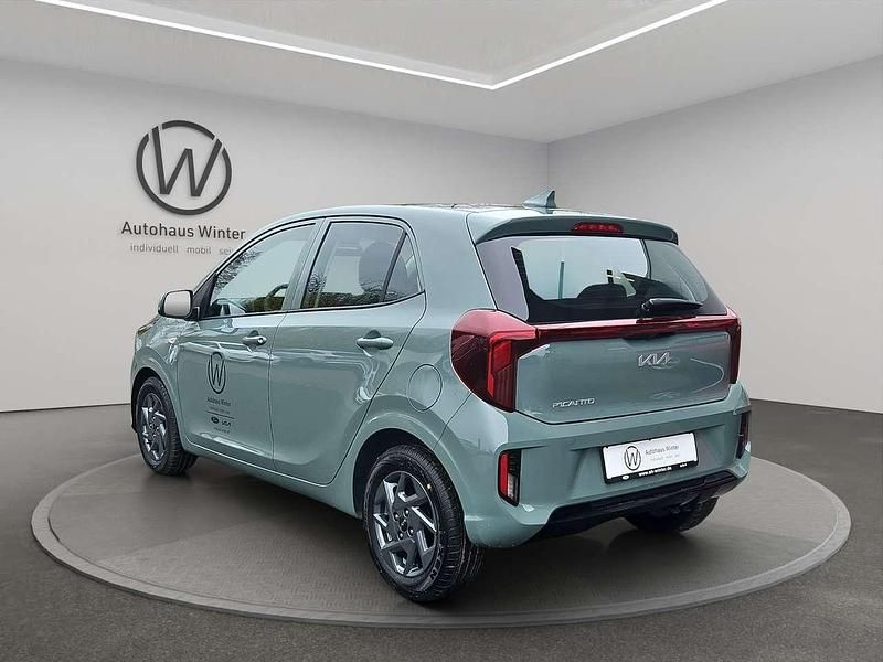 Gebraucht Kia Picanto Vision 68 PS (50 kW) 2025 Adventure grün Kleinwagen
