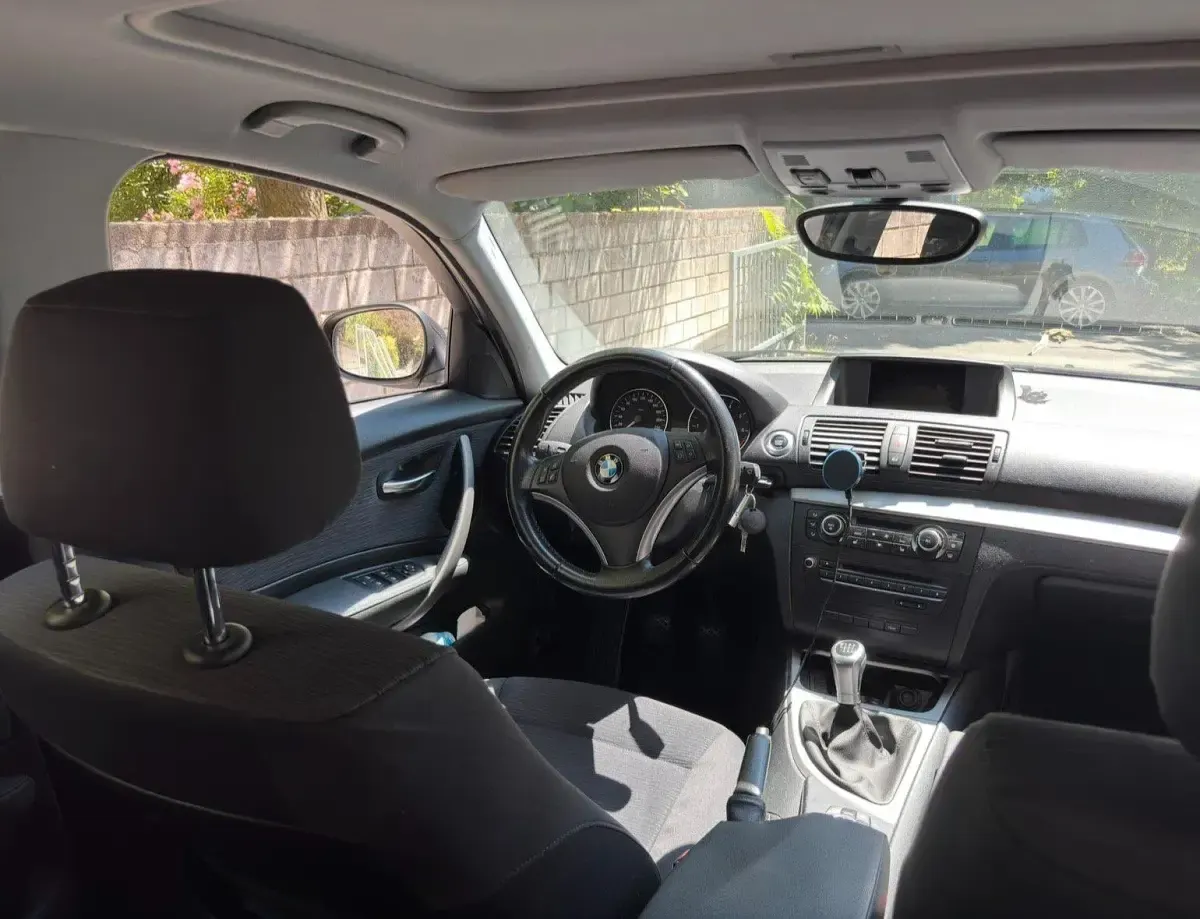 Używany BMW 116 122 KM (89 kW) 2010 Czarny Hatchback