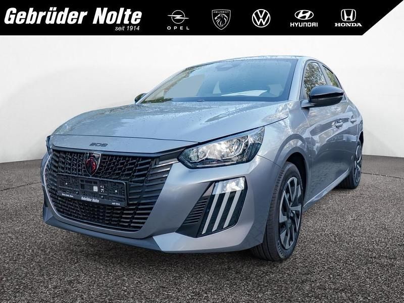 Grau / Neu 2025 Peugeot e-208 Style Kleinwagen | 33.990 € (Etwas zu teuer) - Bild 1/4