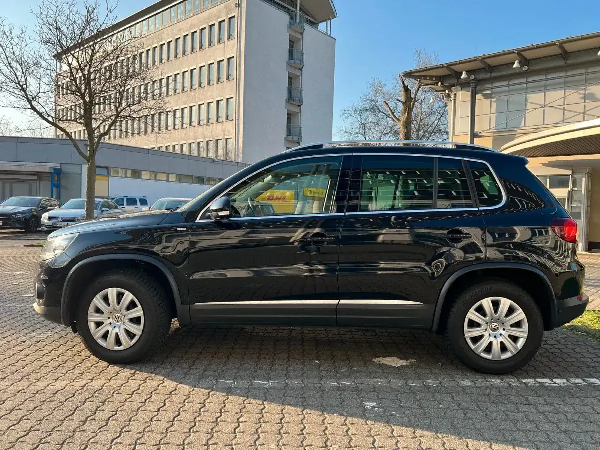 Second-hand VW Tiguan Sportline 160 CP (117 kW) 2014 Negru SUV