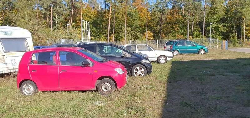 Gebraucht Daihatsu Cuore Plus 58 PS (42 kW) 2003 Rot Kleinwagen