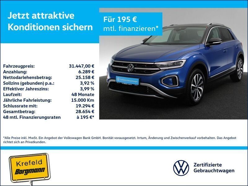 Ravennablau metallic Gebraucht 2023 VW T-Roc Style SUV | 31.447 € (Fairer Preis) - Bild 1/4