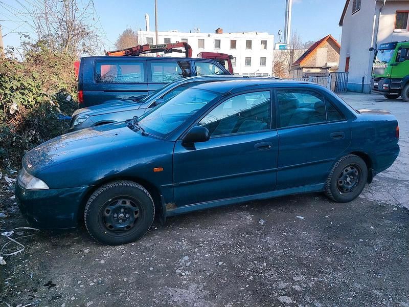 Gebraucht Mitsubishi Carisma 100 PS (73 kW) 1997 Grün Limousine