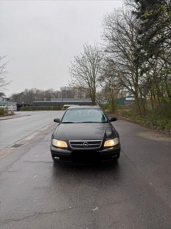 Second-hand Opel Omega 144 CP (105 kW) 2003 Negru Berlinǎ