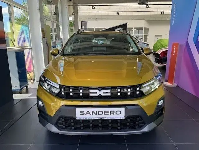 Neu Dacia Sandero Expression 122 PS (89 kW) 2026 Amber yellow Limousine