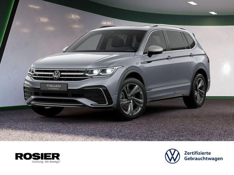 Grau / platinum grey Gebraucht 2024 VW Tiguan Allspace R-line SUV | 47.440 € (Teuer) - Bild 1/4