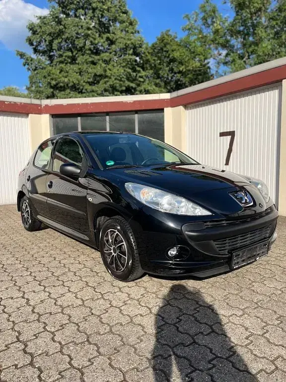Gebraucht Peugeot 206+ 73 PS (53 kW) 2011 Schwarz Kleinwagen