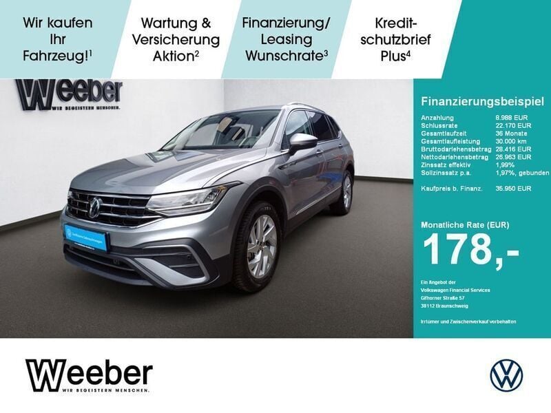 Pyritsilber (metallic) Gebraucht 2024 VW Tiguan Allspace Life SUV | 35.950 € (Superpreis) - Bild 1/4