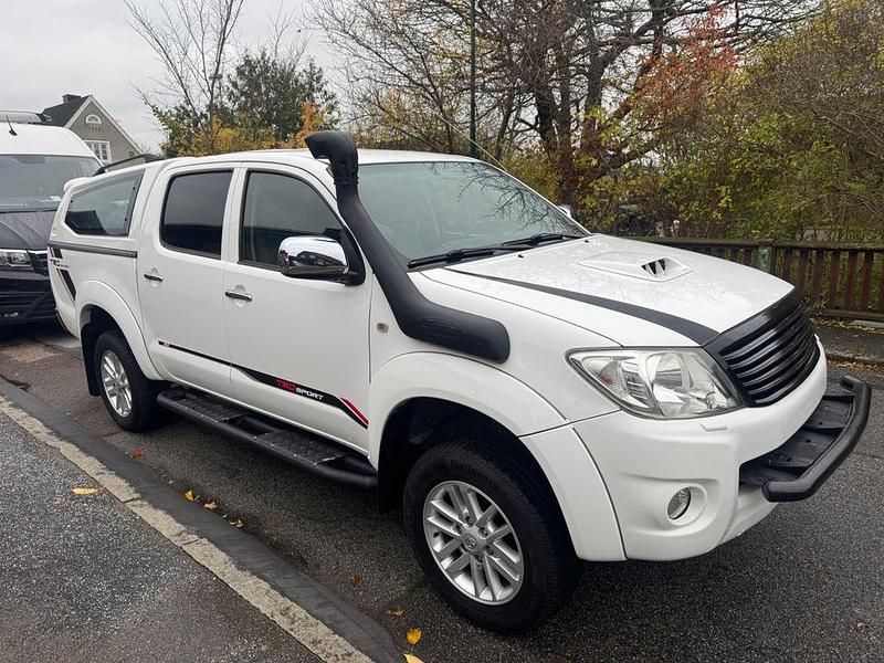 Weiß Gebraucht 2010 Toyota HiLux Abholung | 22.900 € - Bild 1/4