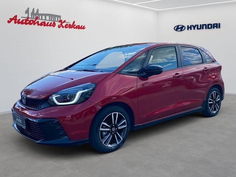 Premium crystal red metallic Neu 2025 Honda Jazz Advance Kleinwagen | 30.990 € (Fairer Preis) - Bild 1/4