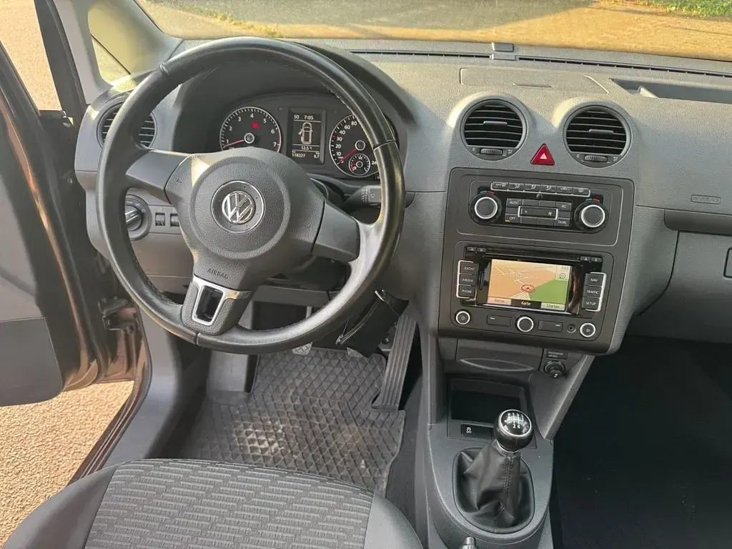 Używany VW Caddy Comfortline 105 KM (77 kW) 2011 Brązowy Minivan