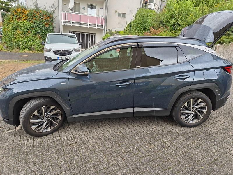 Blau Gebraucht 2020 Hyundai Tucson SUV | 25.500 € (Etwas zu teuer) - Bild 1/4