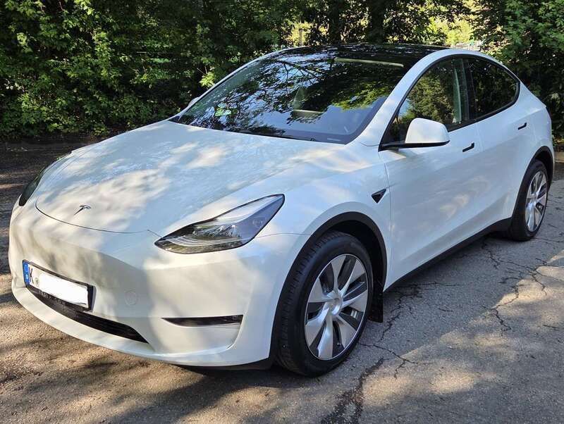 Weiß Gebraucht 2023 Tesla Model Y Long Range SUV | 42.900 € (Etwas zu teuer) - Bild 1/4