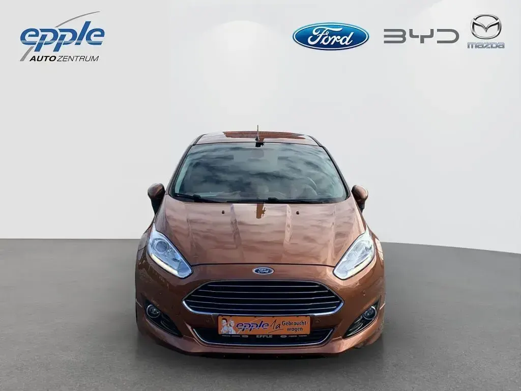 Gebraucht Ford Fiesta Individual 125 PS (91 kW) 2014 Castanobraun metallic Kleinwagen