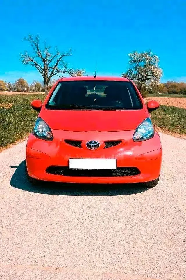 Gebraucht Toyota Aygo 69 PS (50 kW) 2006 Rot Kleinwagen
