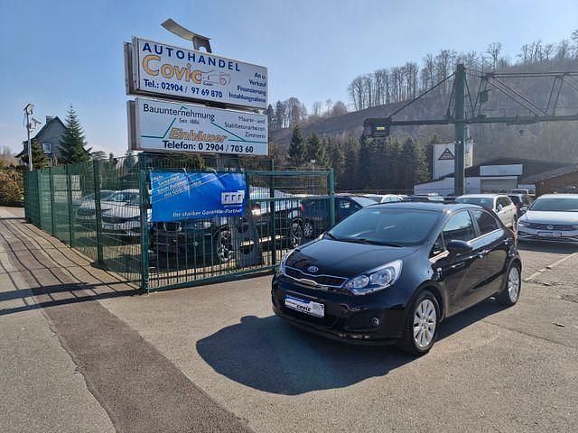 Auroraschwar met. (metallic) Gebraucht 2014 Kia Rio DREAM-TEAM Edition Limousine | 8.495 € (Etwas zu teuer) - Bild 1/1