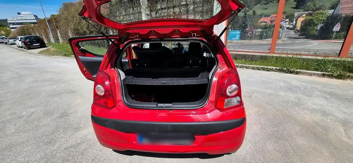 Gebraucht Nissan Pixo 68 PS (50 kW) 2010 Rot Kleinwagen