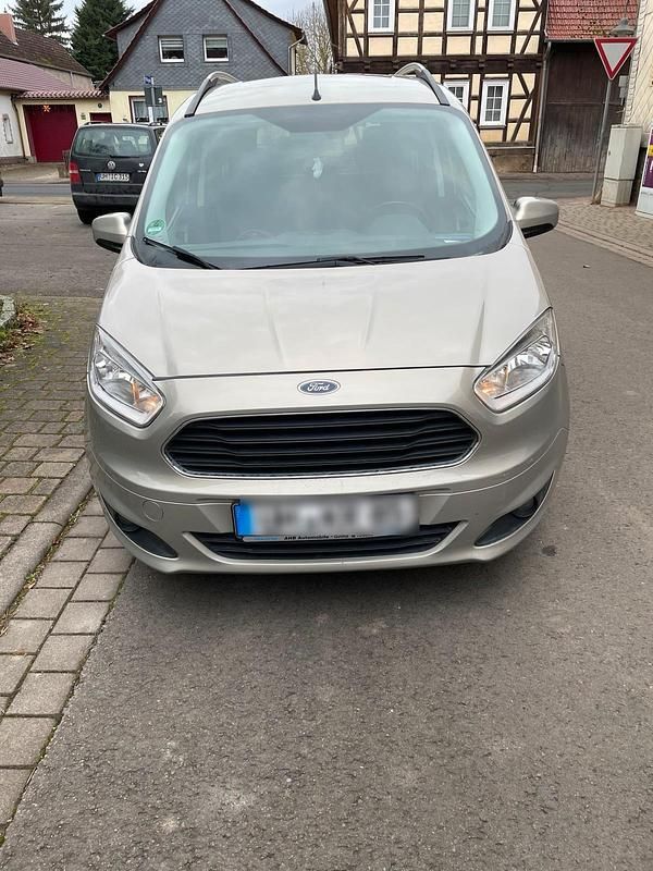 Gebraucht Ford Tourneo Courier 101 PS (74 kW) 2018 Silber Van / Kleinbus