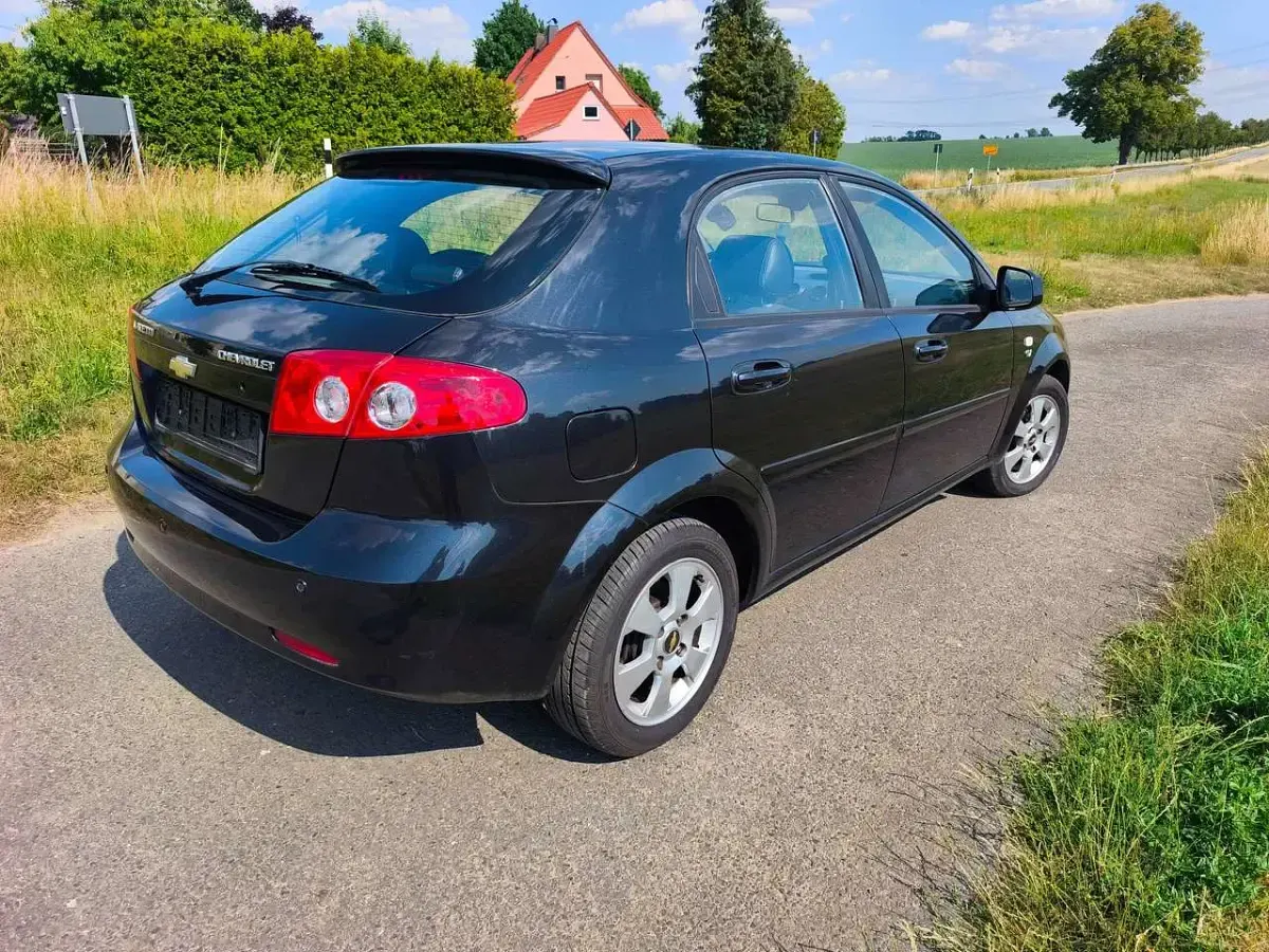 Gebraucht Chevrolet Lacetti CDX 121 PS (88 kW) 2010 Karbonschw graphitschw midnigh Kleinwagen