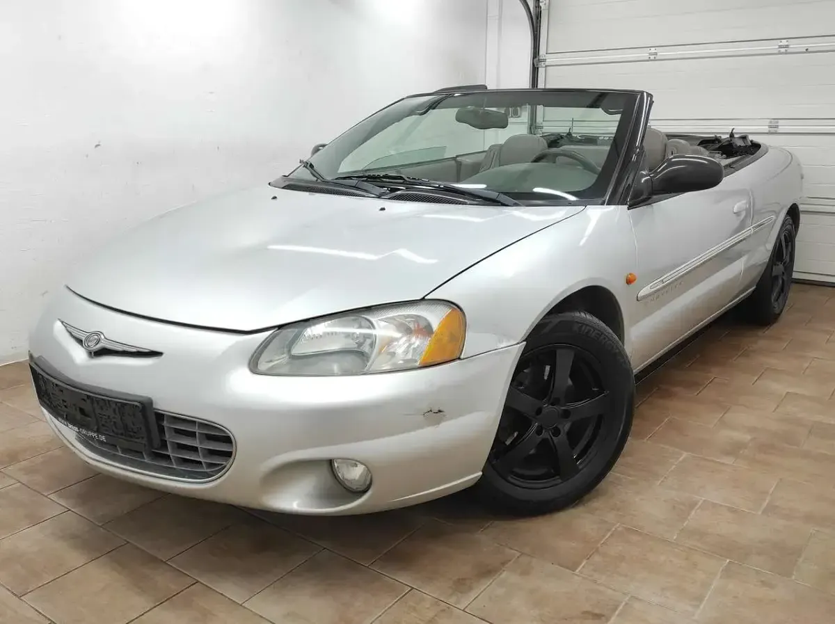 Second-hand Chrysler Sebring Cabriolet 203 CP (149 kW) 2001 Argintiu Cabrio