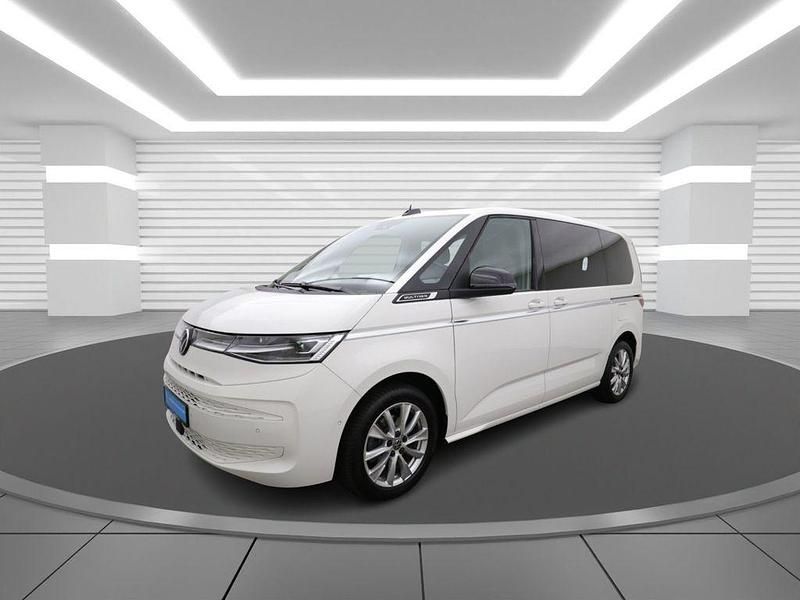 Candyweiß (white), solid Gebraucht 2024 VW T7 Style Van | 54.200 € (Guter Preis) - Bild 1/4
