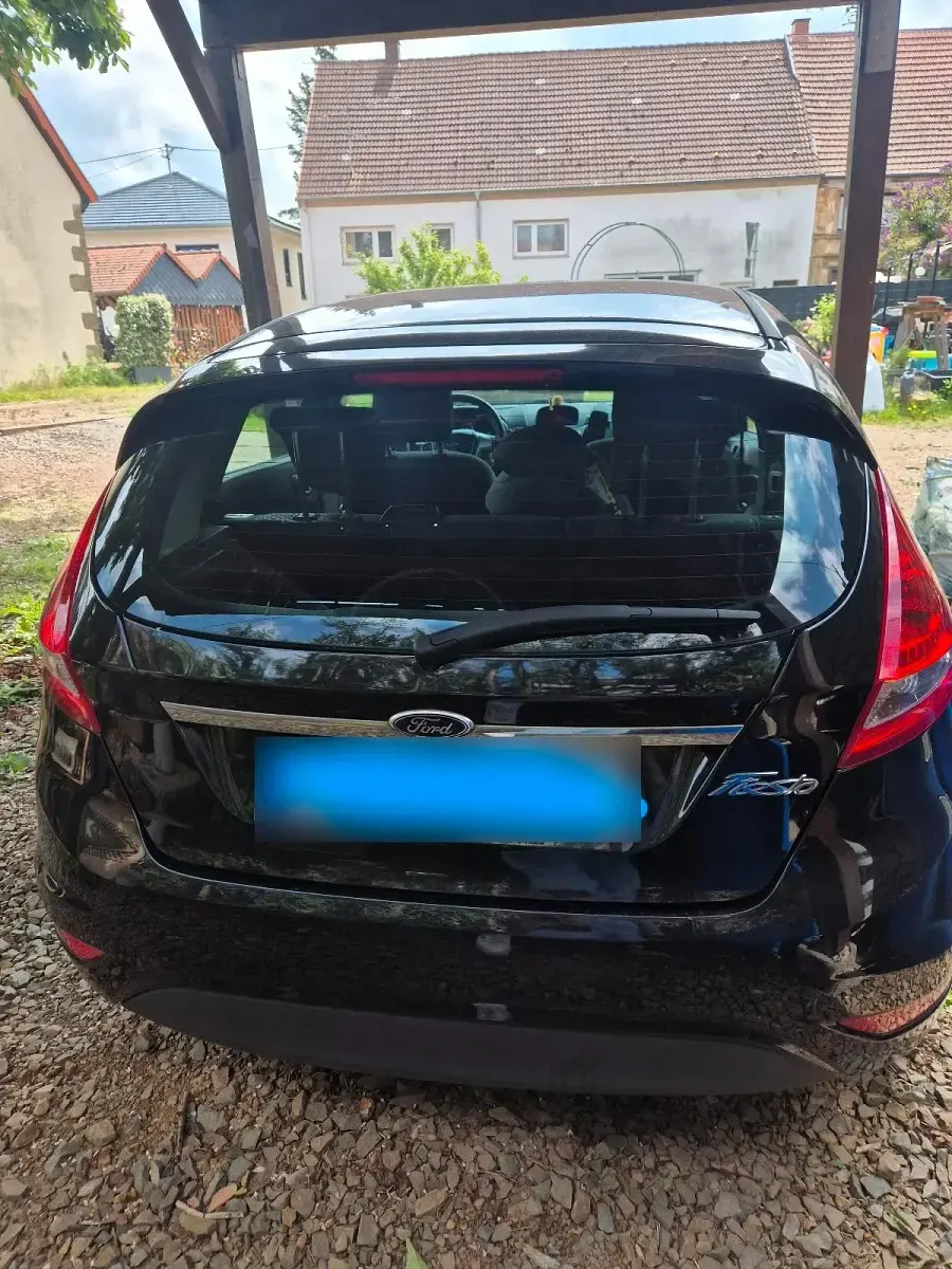 Gebraucht Ford Fiesta 82 PS (60 kW) 2012 Schwarz Limousine