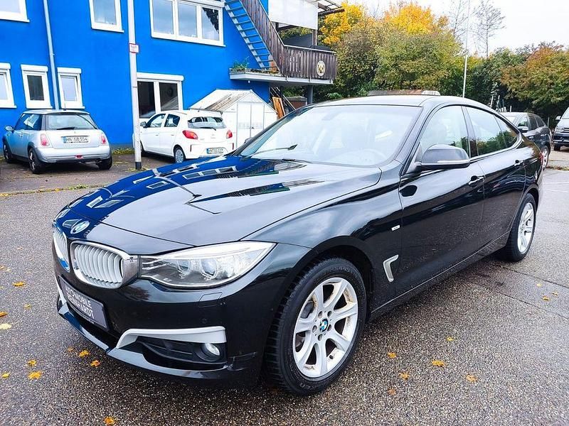 Schwarz Gebraucht 2013 BMW 320 Gran Turismo Comfort Edition Limousine | 7.755 € (Fairer Preis) - Bild 1/4