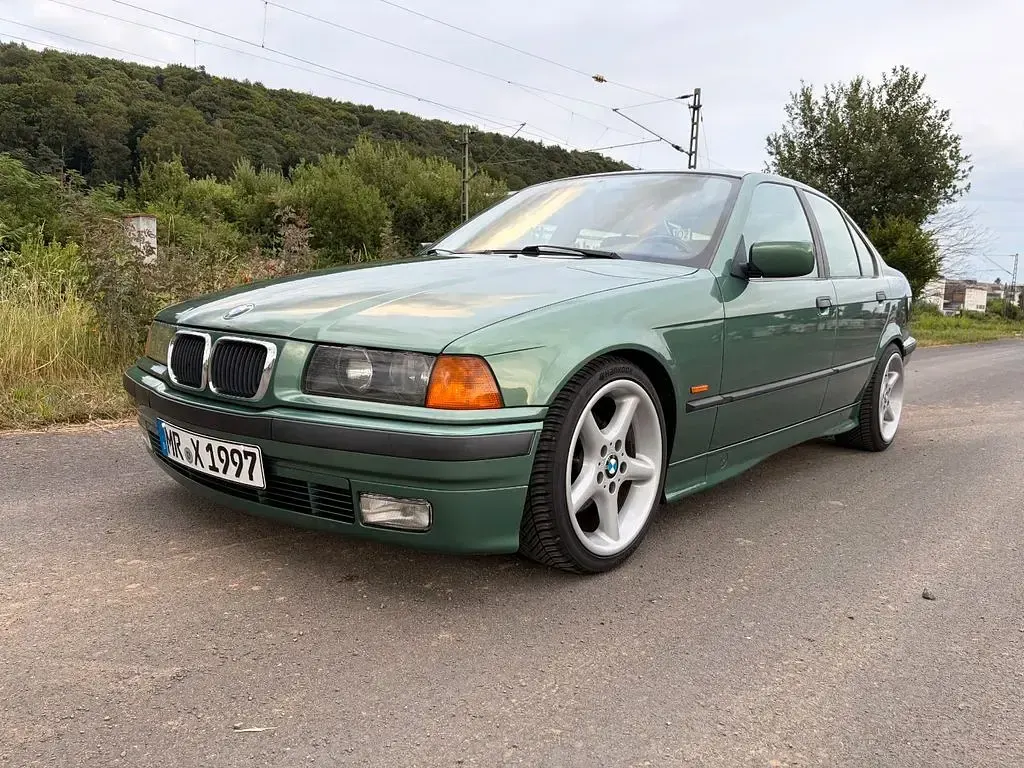 Gebraucht BMW 318 Basis 116 PS (85 kW) 1997 Grün Limousine