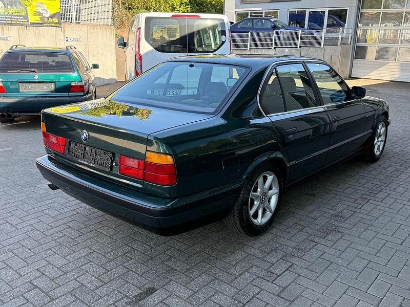 Gebraucht BMW 520 150 PS (110 kW) 1991 Grün Limousine