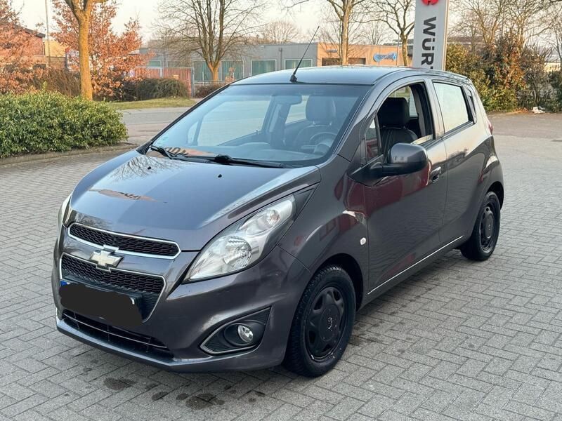 Grau Gebraucht 2013 Chevrolet Spark Kleinwagen | 2.000 € - Bild 1/4