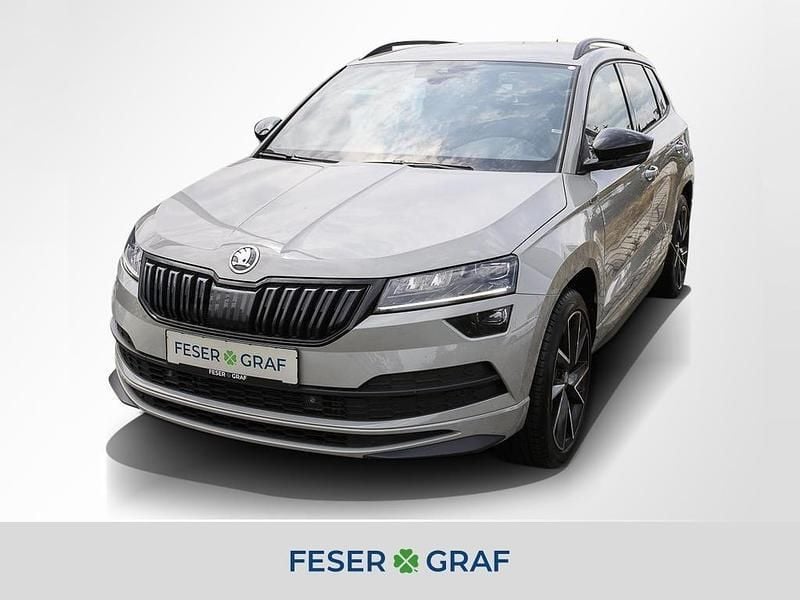 Grau Gebraucht 2020 Skoda Karoq SportLine SUV | 23.440 € (Fairer Preis) - Bild 1/4
