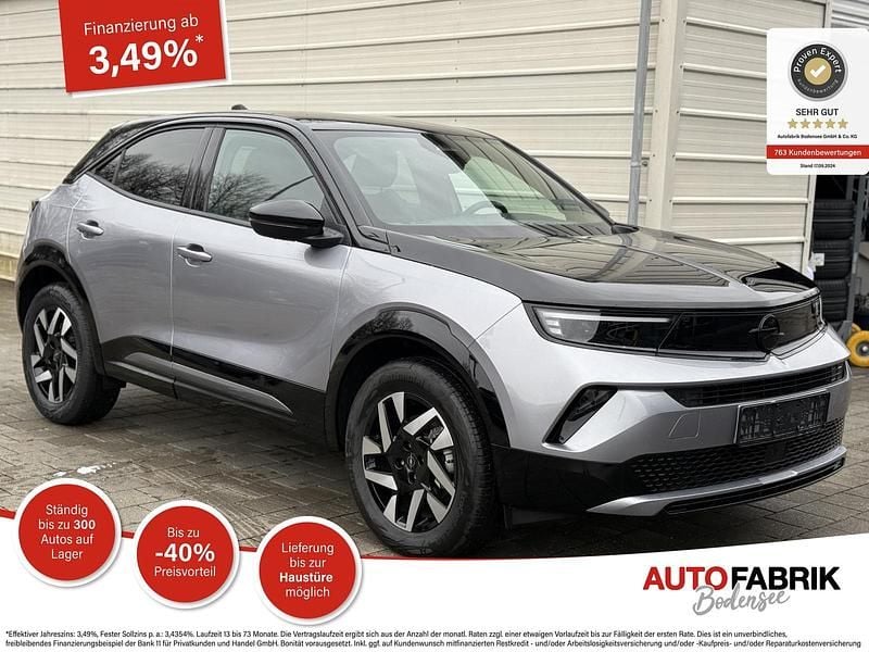 Neu Opel Mokka 145 PS (106 kW) 2025 Tropikal grün metallic / schwarzes dach SUV