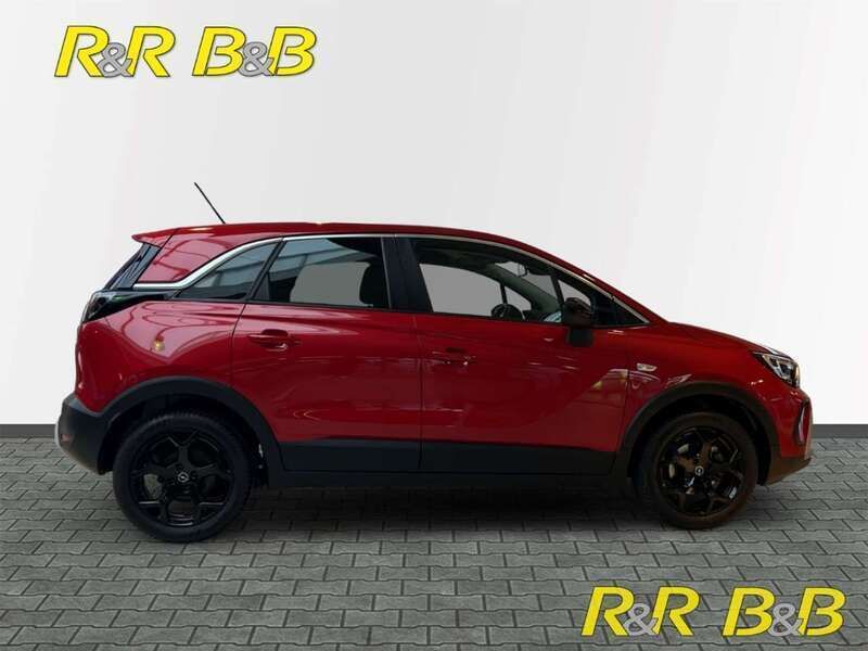 Gebraucht Opel Crossland Elegance 131 PS (96 kW) 2024 Lackierung peperoncino red/metallic klar (metallic) SUV