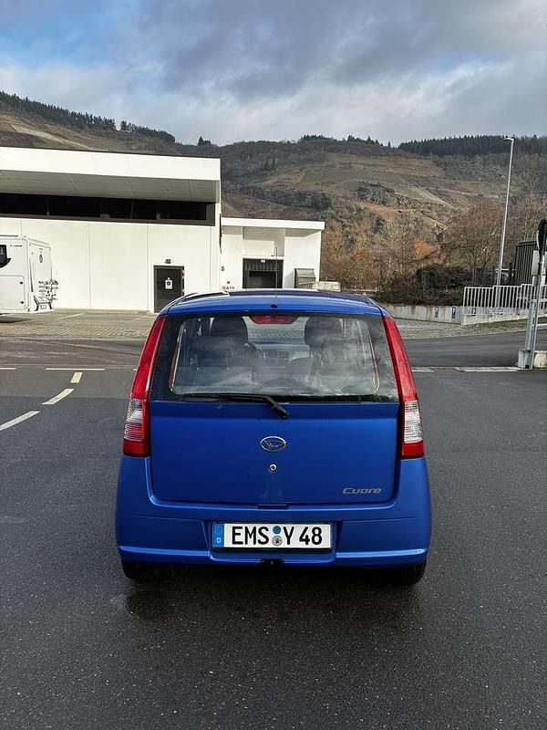 Gebraucht Daihatsu Cuore 58 PS (42 kW) 2004 Kleinwagen