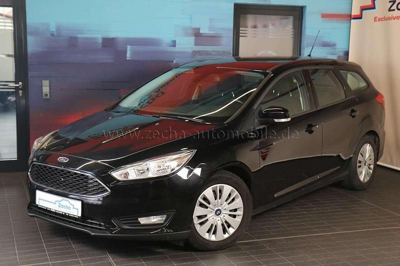 Pantherschwarz Gebraucht 2015 Ford Focus Kombi | 6.499 € (Superpreis) - Bild 1/4