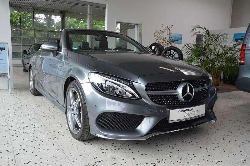 Selenitgrau metallic Gebraucht 2017 Mercedes C200 AMG line Cabrio | 26.950 € (Fairer Preis) - Bild 1/4
