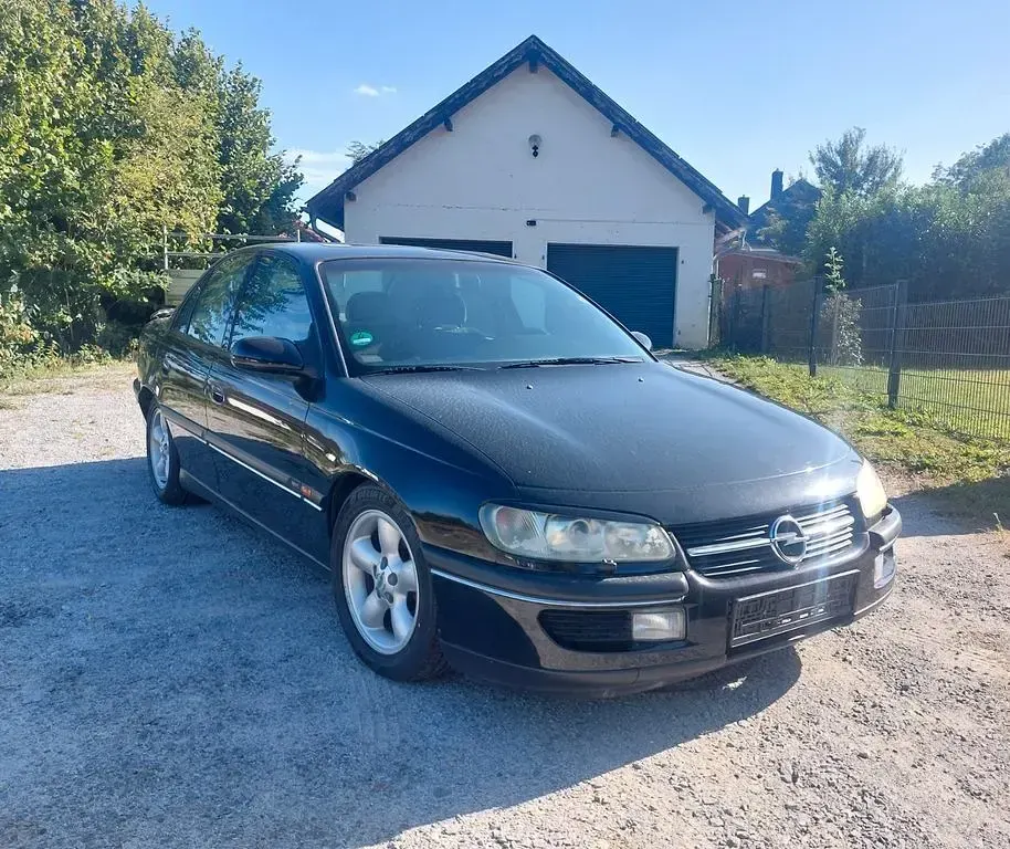 Gebraucht Opel Omega Sport 136 PS (100 kW) 1998 Schwarz Limousine