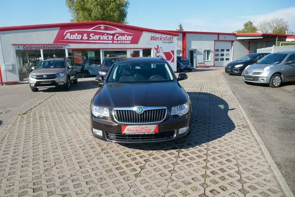Używany Skoda Superb Ambition 140 KM (102 kW) 2012 Brązowy Kombi