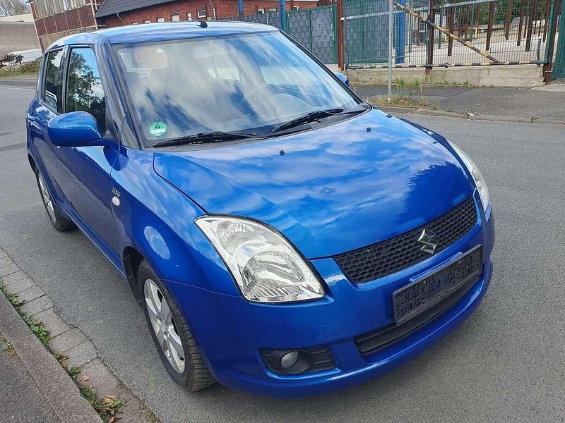 Blau Gebraucht 2009 Suzuki Swift Limousine | 1.800 € (Fairer Preis) - Bild 1/4