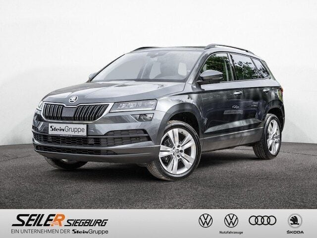 Grau / quarzgrau Gebraucht 2019 Skoda Karoq Style SUV | 23.840 € (Etwas zu teuer) - Bild 1/4