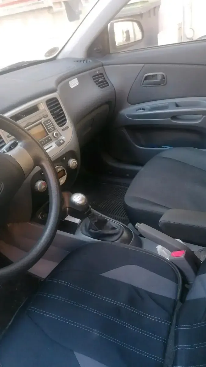 Gebraucht Kia Rio 109 PS (80 kW) 2009 Grau Limousine