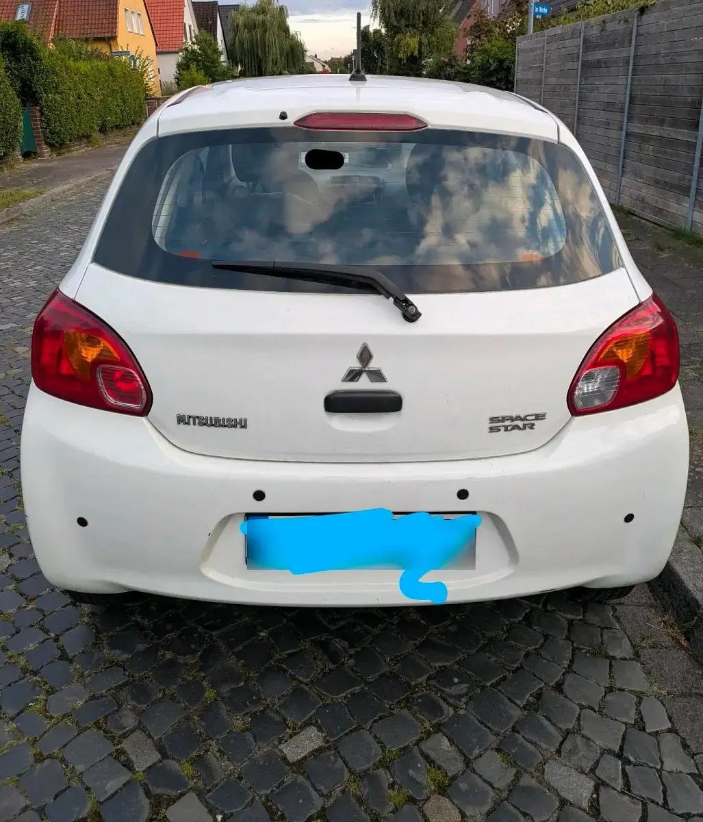 Gebraucht Mitsubishi Space Star 71 PS (52 kW) 2015 Weiß Kleinwagen
