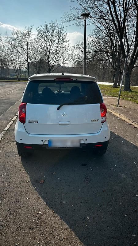 Gebraucht Mitsubishi Colt 98 PS (72 kW) 2013 Weiß Kleinwagen