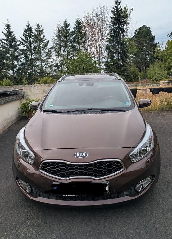 Braun Gebraucht 2014 Kia Ceed Sportswagon Platinum Kombi | 7.500 € (Superpreis) - Bild 1/4
