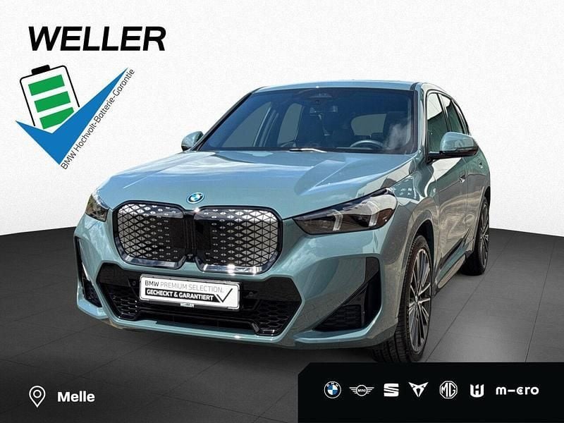 Cape york grün (grün) Gebraucht 2024 BMW iX1 Comfort Edition SUV | 49.950 € (Superpreis) - Bild 1/4
