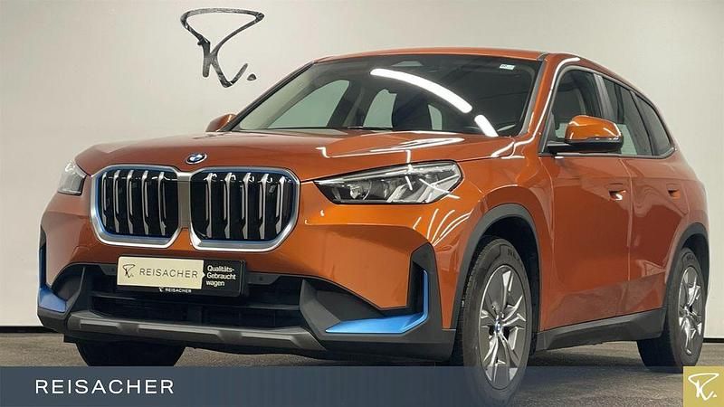 Utah orange metallic Gebraucht 2022 BMW iX1 Performance SUV | 30.899 € (Guter Preis) - Bild 1/4
