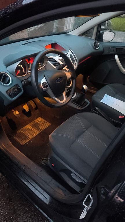 Gebraucht Ford Fiesta Titanium 82 PS (60 kW) 2011 Schwarz Kleinwagen