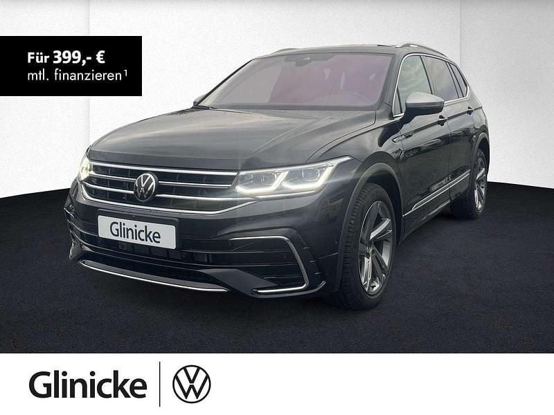 Deep black perleffekt Neu 2025 VW Tiguan Allspace R-line SUV | 52.460 € (Fairer Preis) - Bild 1/3